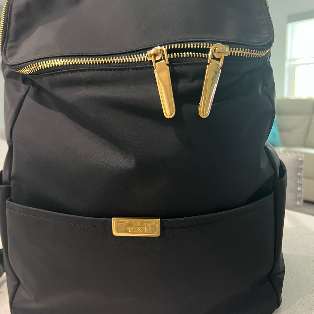 Tunic Backpack.